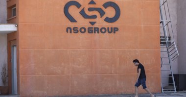 A logo adorns a wall on a branch of the Israeli NSO Group company, near the southern Israeli town of Sapir, Aug. 24, 2021. (AP Photo)