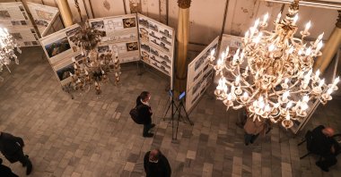 Visitors examine the "Jewish Identity Engraved on Stones" exhibit at Zulfaris Synagogue, Istanbul, Turkey, Nov. 4, 2021. (AA Photo)