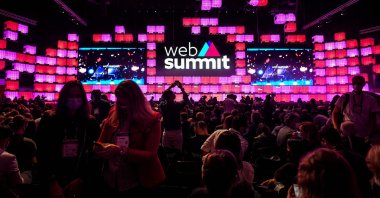 Web summit attendees take pictures with their smartphones on the opening day of the Web Summit in Lisbon, Portugal, Nov. 1, 2021. (AFP Photo)