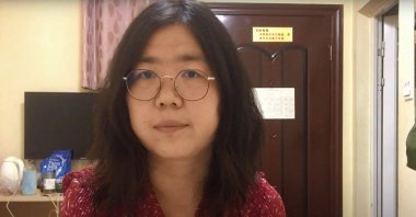 This file screengrab taken on Dec. 28, 2020, from an undated video showing former Chinese lawyer and citizen journalist Zhang Zhan as she broadcasts via YouTube, at an unconfirmed location in China. (Youtube via AFP)