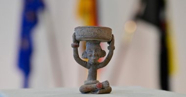 A "Figure with Candle Holder" is seen during a handing over ceremony of a small trove of Mayan cultural artifacts being returned to Mexico and Guatemala in Berlin, Germany, Nov. 5, 2021. (AFP Photo)