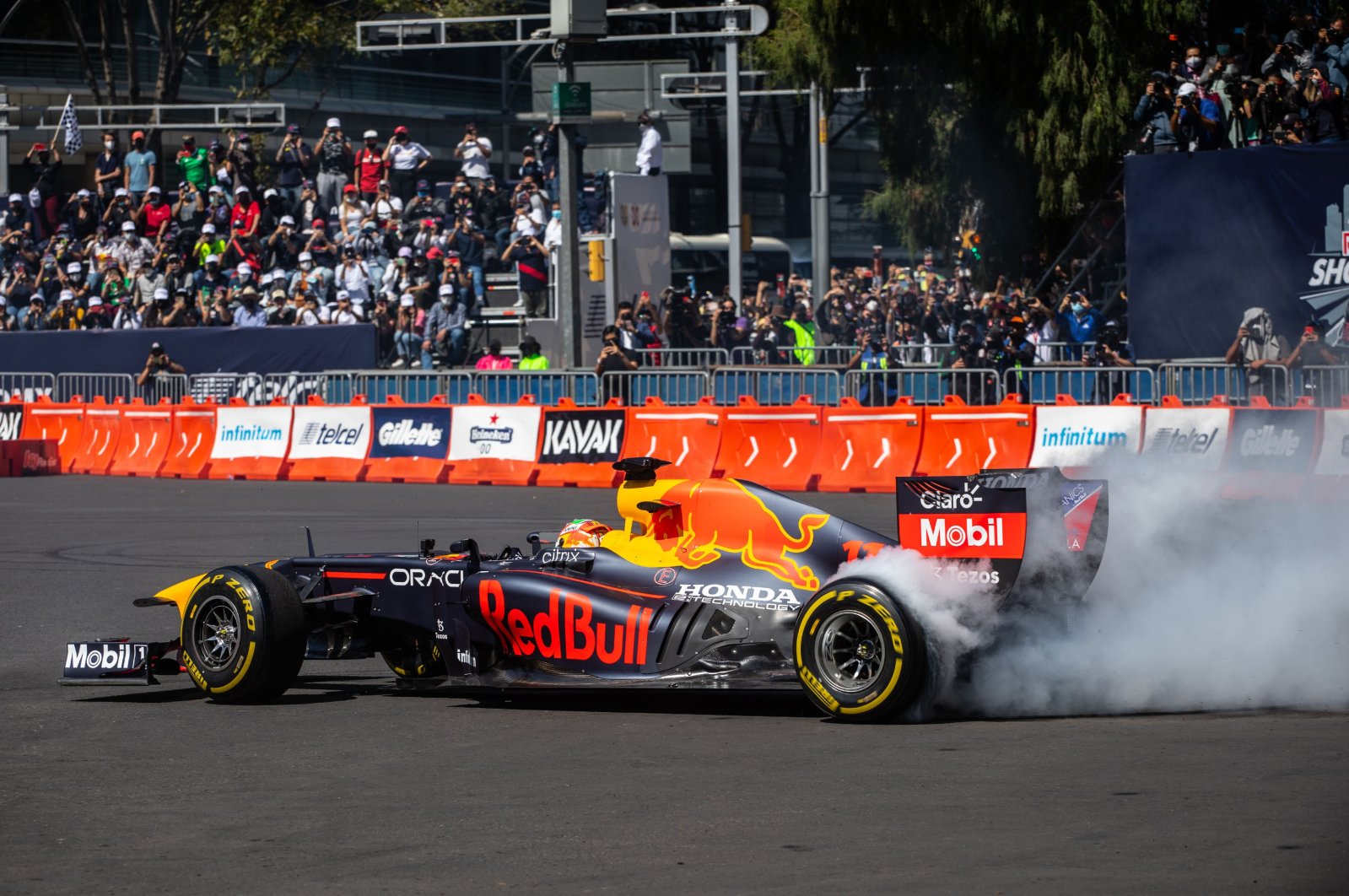 Red Bull driver Sergio Perez performs stunts during a special event ahead of the Mexico Grand Prix in Mexico City, Mexico, Nov. 4, 2021. (AA Photo)