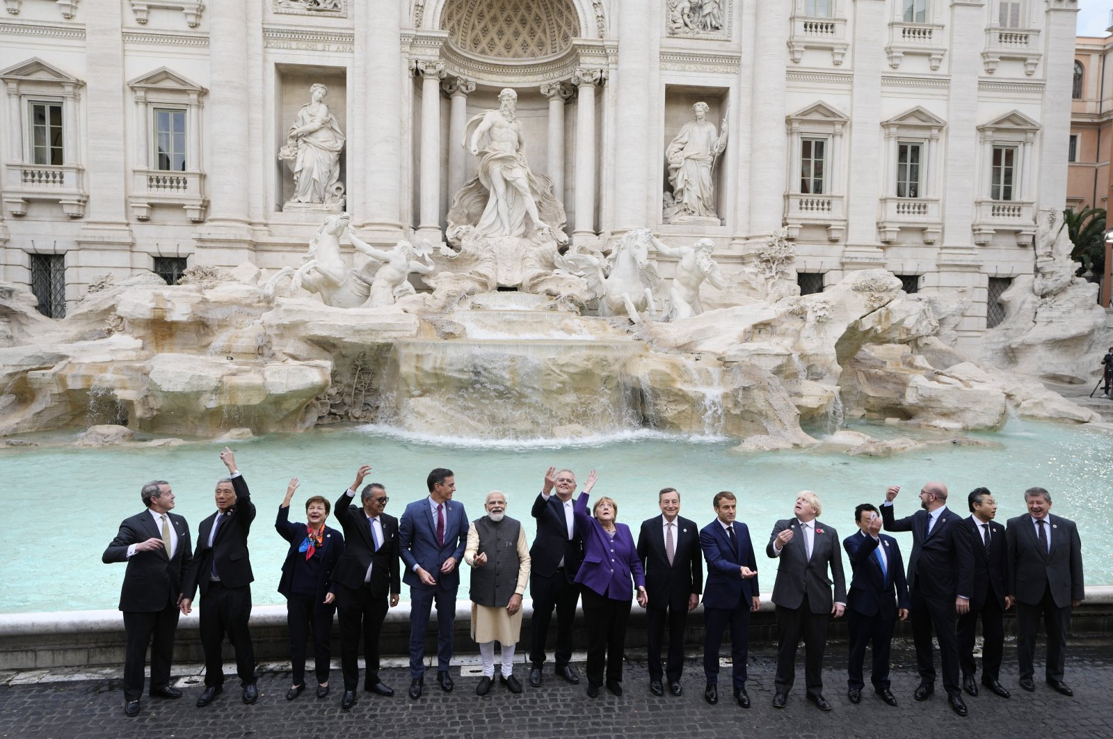 Leaders pose in front of the Trevi Fountain during the G-20 summit in Rome, Italy, Oct. 31, 2021. (AP Photo)