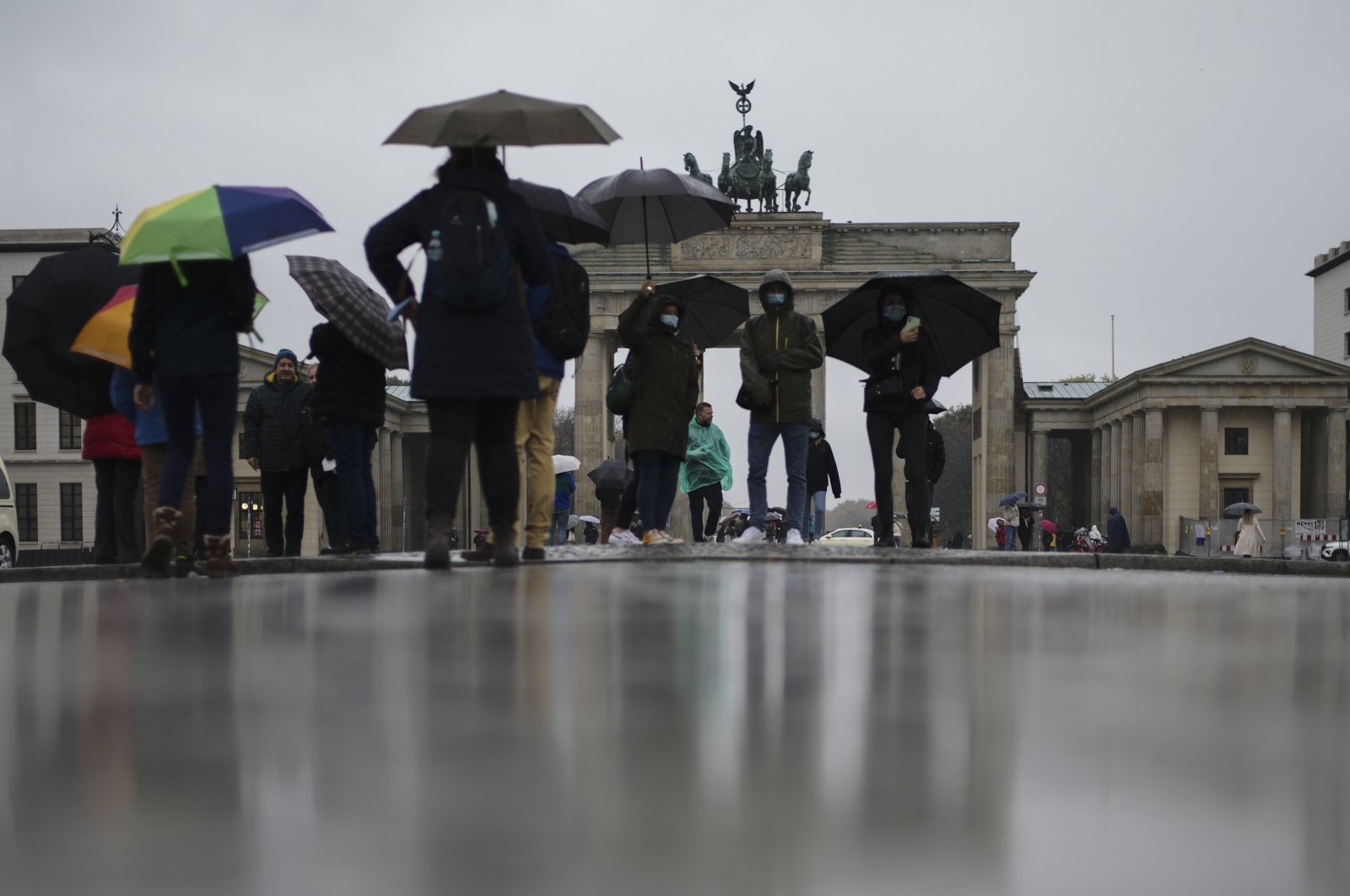 People gather in front of Germany's landmark in Berlin, Germany, Nov. 4, 2021. (AP Photo)