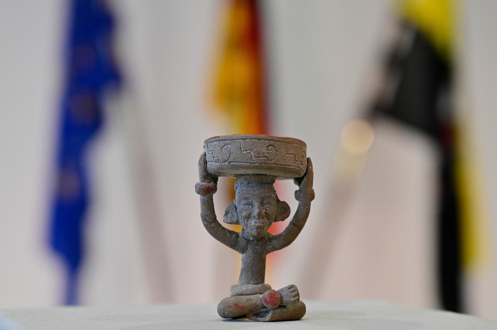 A "Figure with Candle Holder" is seen during a handing over ceremony of a small trove of Mayan cultural artifacts being returned to Mexico and Guatemala in Berlin, Germany, Nov. 5, 2021. (AFP Photo)