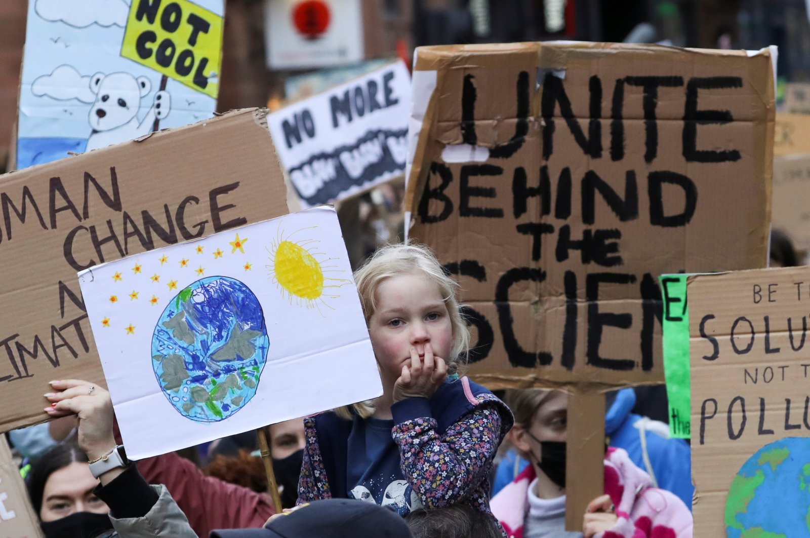 Demonstrators carry placards at a Fridays for Future march during the United Nations Climate Change Conference – COP26 – in Glasgow, Scotland, U.K., Nov. 5, 2021. (Reuters Photo)