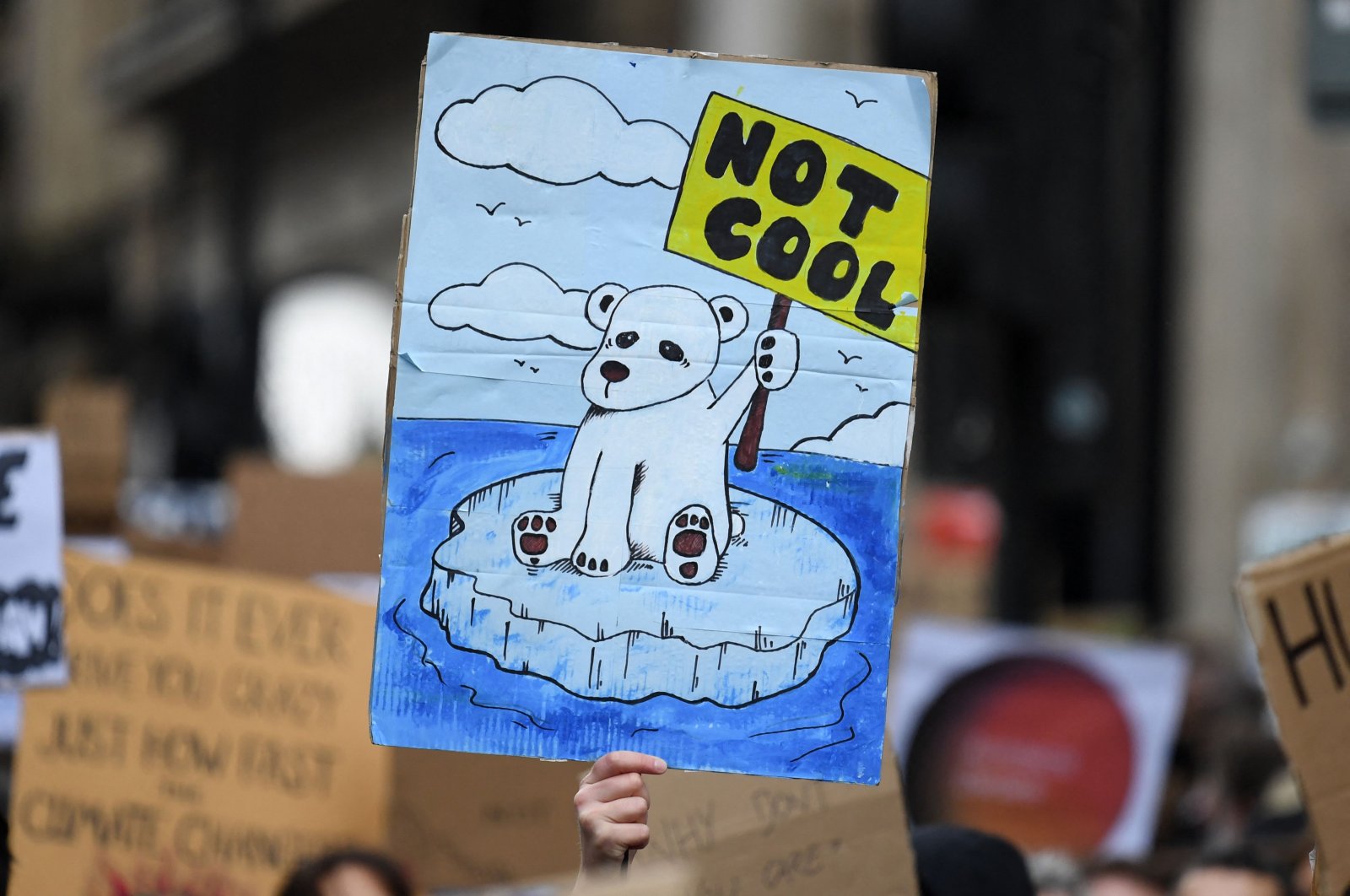Demonstrators carry placards at a Fridays for Future march during the United Nations Climate Change Conference – COP26 – in Glasgow, Scotland, U.K., Nov. 5, 2021. (AFP Photo)