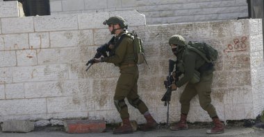 Israeli soldiers conduct an operation in Ramallah, occupied West Bank, Palestine, Dec. 10, 2018. (AP Photo)