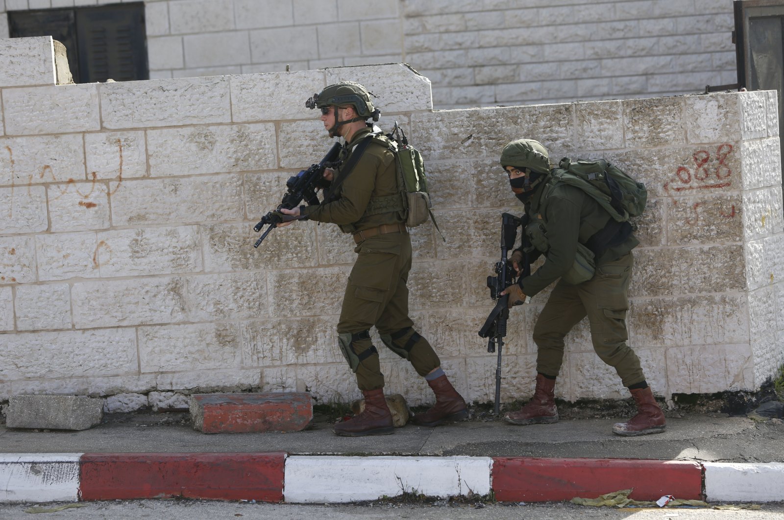 Israeli soldiers conduct an operation in Ramallah, occupied West Bank, Palestine, Dec. 10, 2018. (AP Photo)