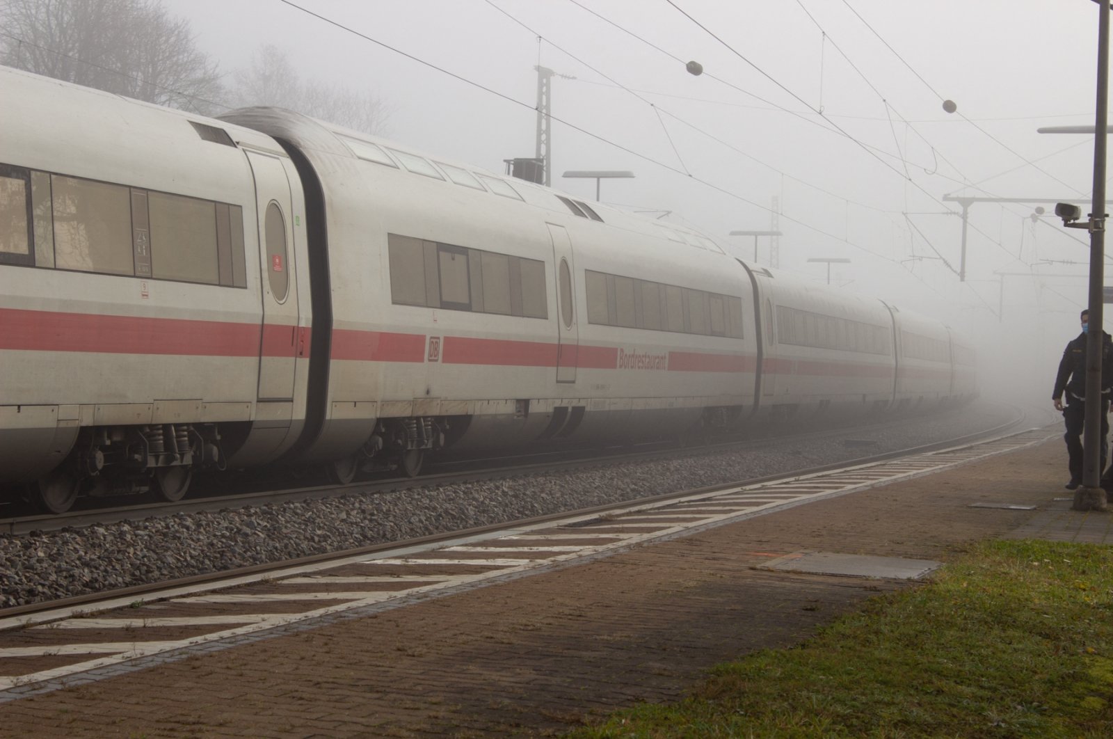 An ICE high-speed train is seen at the train station of Seubersdorf, southern Germany, on Nov. 6, 2021, after several people were wounded in a knife attack on the train. (Photo by dpa / AFP)