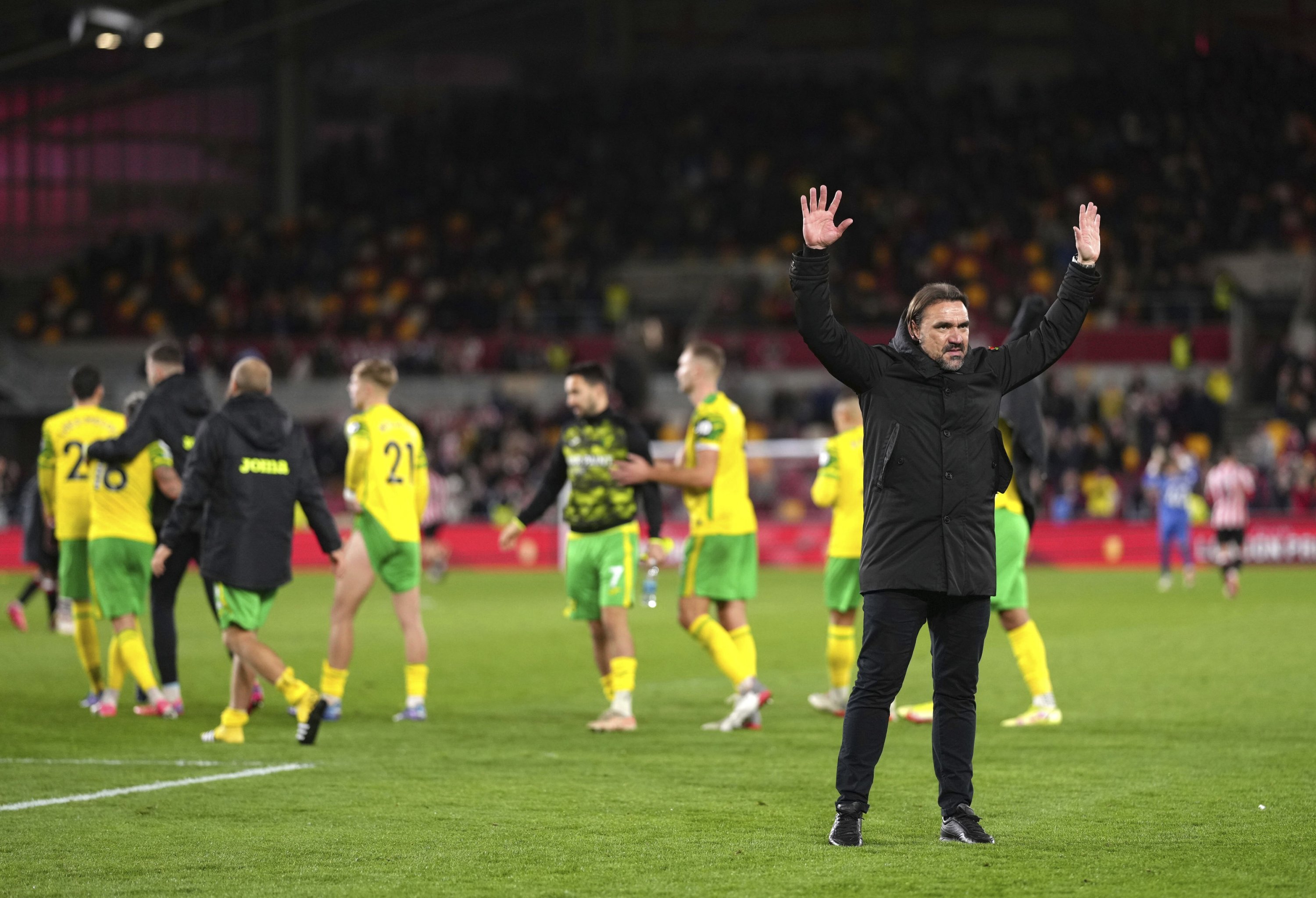 Norwich City manager Daniel Farke salutes the fans after the final whistle of a Premier League match against Brentford, London, England, Nov. 6, 2021. (AP Photo)