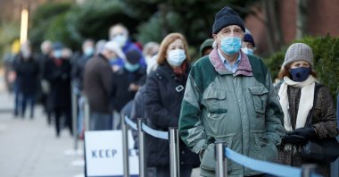 People wait in line to enter Lord's Cricket Ground to receive the coronavirus vaccine, amid the outbreak of coronavirus in London, U.K., Jan. 22, 2021. (Reuters Photo)