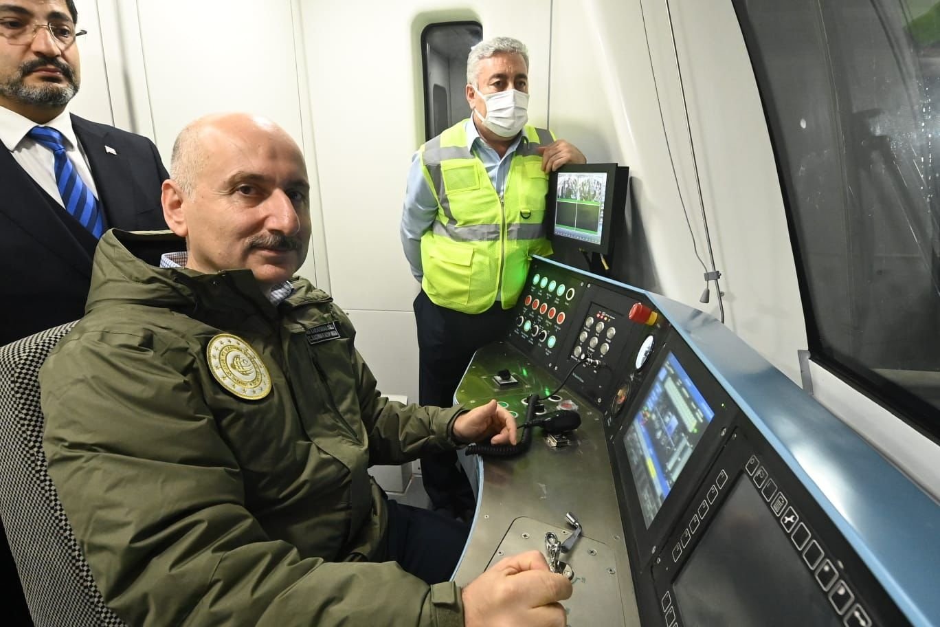 Minister of Transportation and Infrastructure Adil Karaismailoğlu drives the train in a test ride, in Istanbul, Turkey, Nov. 8, 2021. (PHOTO BY BARIŞ SAVAŞ) 