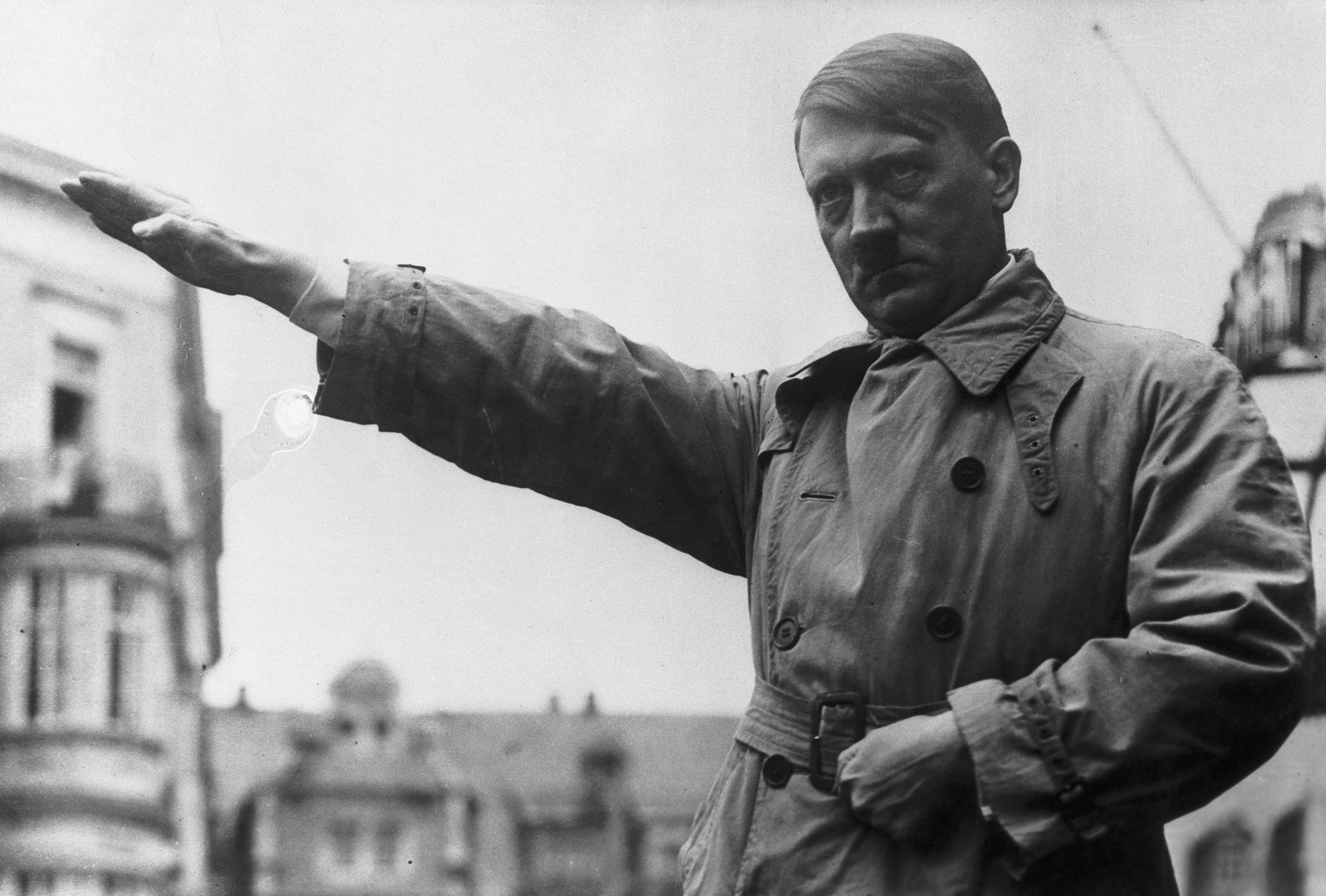 Picture shows Adolf Hitler extending his hands in the Fascist salute. (Getty Images) 