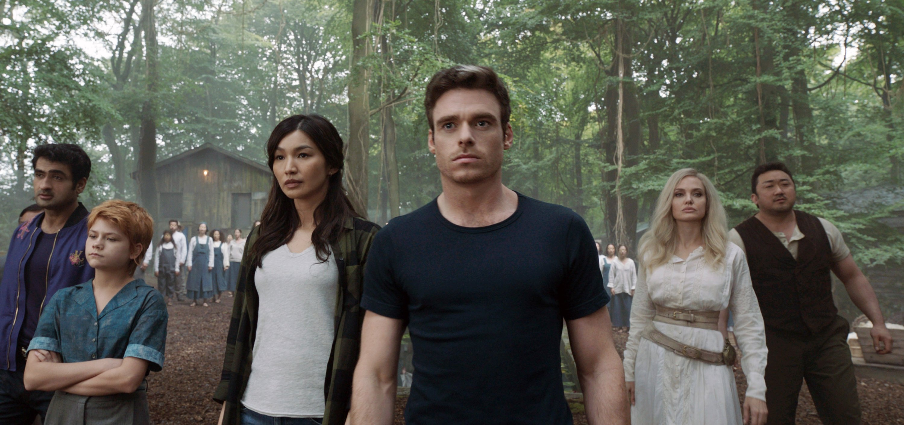 From the left, Kumail Nanjiani, Lia McHugh, Gemma Chan, Richard Madden, Angelina Jolie and Don Lee, in a scene from the Marvel film 'Eternals.' (Marvel Studios via AP)