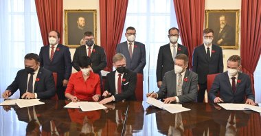Bottom row from left, leaders of the Together coalition Marian Jurecka (Christian Democrats), Marketa Pekarova Adamova (TOP 09), Petr Fiala (Civic Democrats), leader of Mayors and Independents Vit Rakusan and leader of Pirates Ivan Bartos signed their government coalition agreement in the Czech Chamber of Deputies, in Prague, Czech Republic, Nov. 8, 2021. (AP Photo)