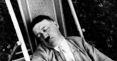Adolf Hitler photographed during an afternoon nap in a deck chair in Bavaria around 1930. (Getty Images) 