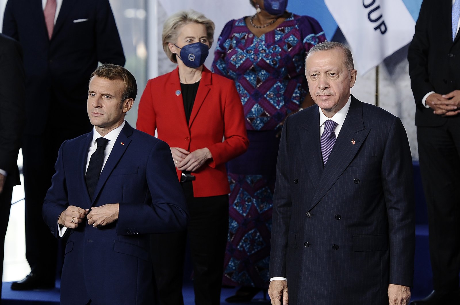 President Recep Tayyip Erdoğan and France's President Emmanuel Macron (L) attend the group photo session at the G-20 summit in Rome, Italy, Oct. 30, 2021. (Photo by Getty Images)