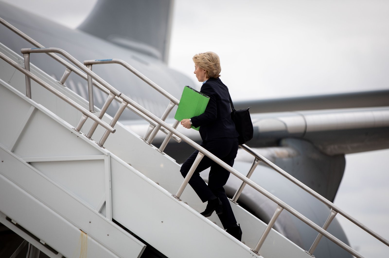 Incumbent European Commission President and then German Defense Minister Ursula von der Leyen (CDU) goes up the gangway to the air force's Airbus A310 at Washington airport for the return flight to Berlin, Washington, D.C., U.S., April 12, 2019. (Photo by Getty Images)
