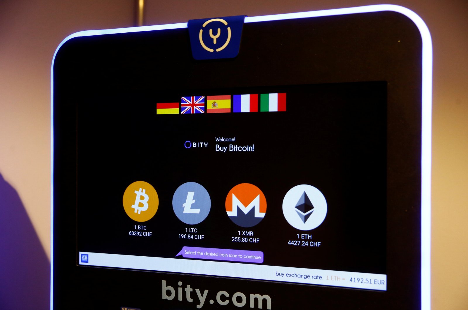 The logos and exchange rates of Bitcoin (BTH), Litecoin (LTC), Monero (XMR) and Ether (ETH) to Swiss franc (CHF) are seen on the display of a cryptocurrency ATM of blockchain payment service provider Bity at the House of Satoshi bitcoin and blockchain shop in Zurich, Switzerland, Nov. 4, 2021. (Reuters Photo)