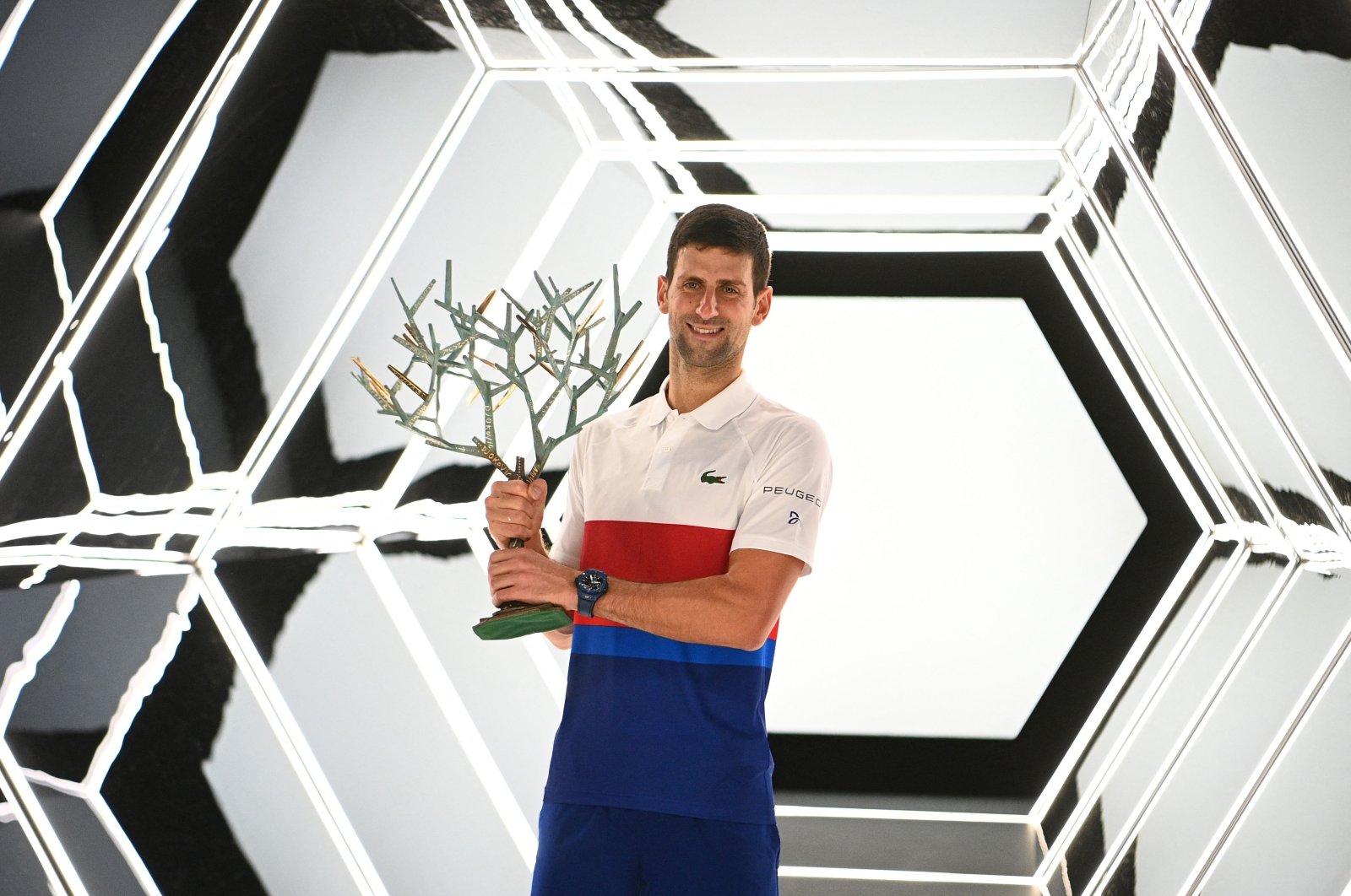 Novak Djokovic poses with the ATP Paris Masters trophy after winning the final against Russia's Daniil Medvedev, Paris, France, Nov. 7, 2021. (AFP Photo)