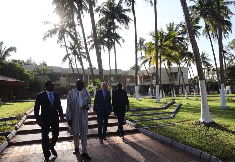 From left to right, Togo’s President Faure Gnassingbe, Burkina Faso’s President Roch Marc Christian Kabore, President Recep Tayyip Erdoğan and Liberia’s President George Weah walk ahead of a working dinner, in Lome, Togo, Oct. 19, 2021. (AA Photo)