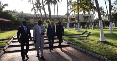 From left to right, Togo’s President Faure Gnassingbe, Burkina Faso’s President Roch Marc Christian Kabore, President Recep Tayyip Erdoğan and Liberia’s President George Weah walk ahead of a working dinner, in Lome, Togo, Oct. 19, 2021. (AA Photo)