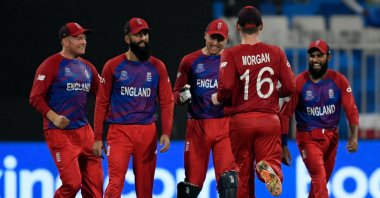 England's players celebrate the dismissal of Sri Lanka's Dasun Shanaka during an ICC men's T20 World Cup match at the Sharjah Cricket Stadium, Sharjah, UAE, Nov. 1, 2021. (AFP Photo)