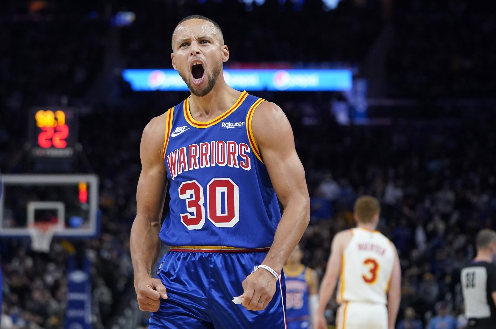 Golden State Warriors guard Stephen Curry reacts during an NBA game against the Atlanta Hawks in San Francisco, U.S., Nov. 8, 2021. (AP Photo)