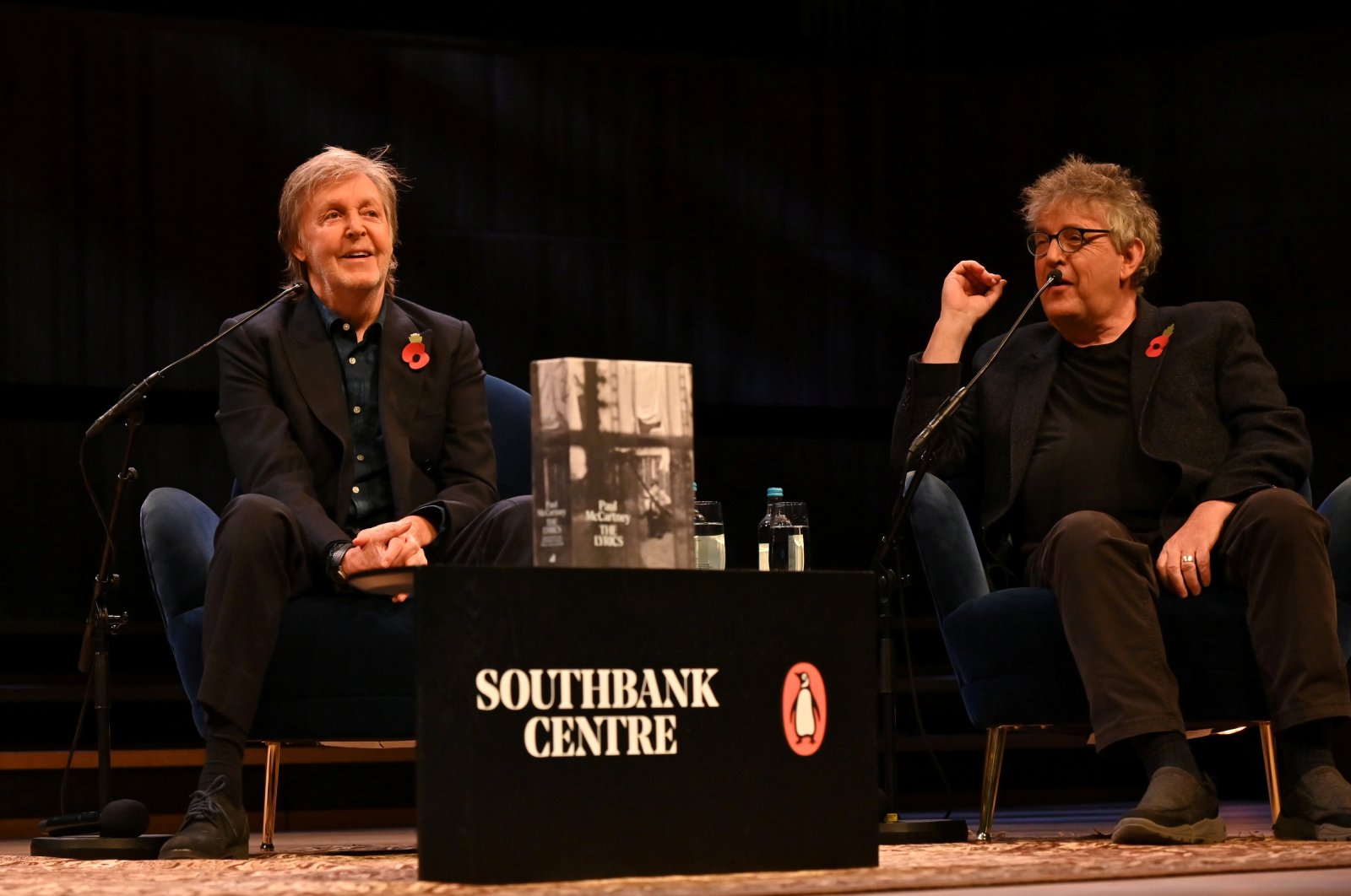 Paul McCartney is seen on stage at the Southbank's Royal Festival Hall in conversation with Paul Muldoon (editor) and Samira Ahmed (unseen) in London, Britain, Nov. 5, 2021. (Reuters Photo)