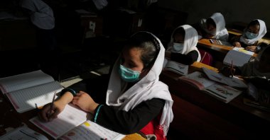 Hadia, 10, a fourth grade primary school student attends class in Kabul, Afghanistan, Oct. 25, 2021. (Reuters Photo)