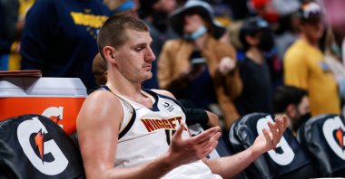 Nikola Jokic reacts on the bench during an NBA game against Miami Heat at Ball Arena, Colorado, U.S., Nov 8, 2021. (Reuters Photo)