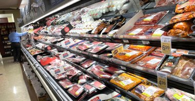 A customer shops for meat at a Safeway store in San Francisco, California, U.S., Oct. 4, 2021. (AFP Photo)