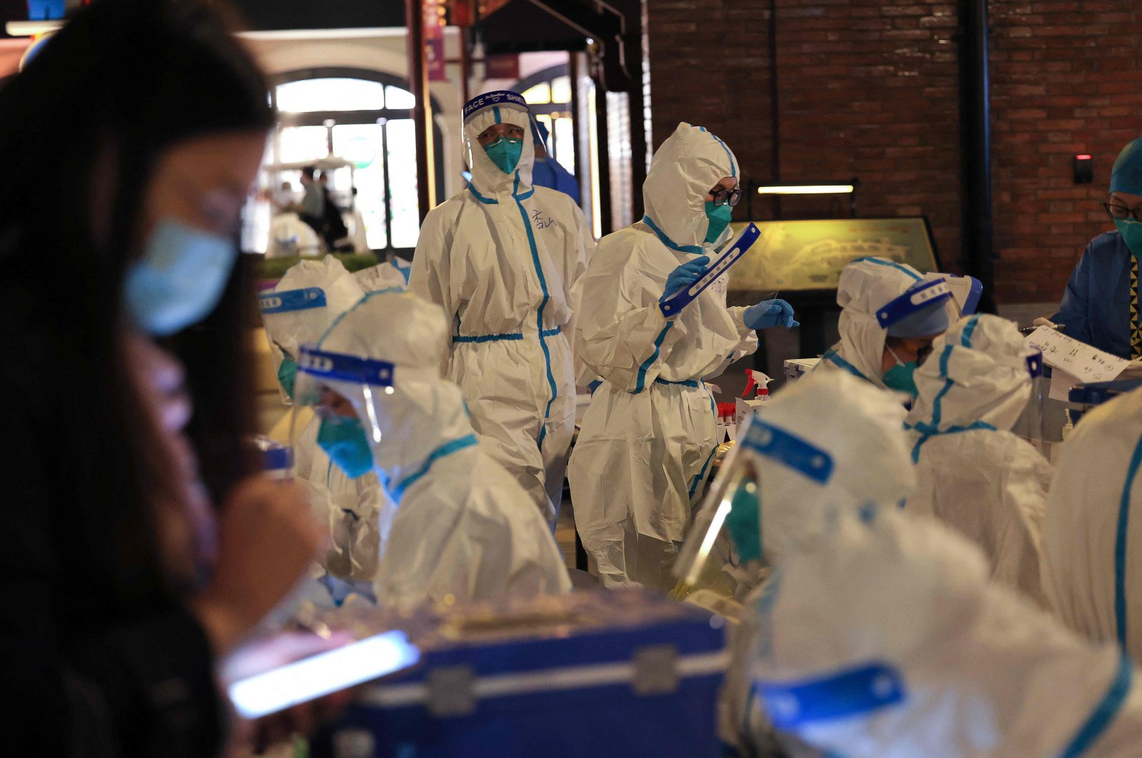Medical personnel preparing to test visitors at Shanghai Disneyland for COVID-19, Shanghai, China, Oct. 31, 2021.