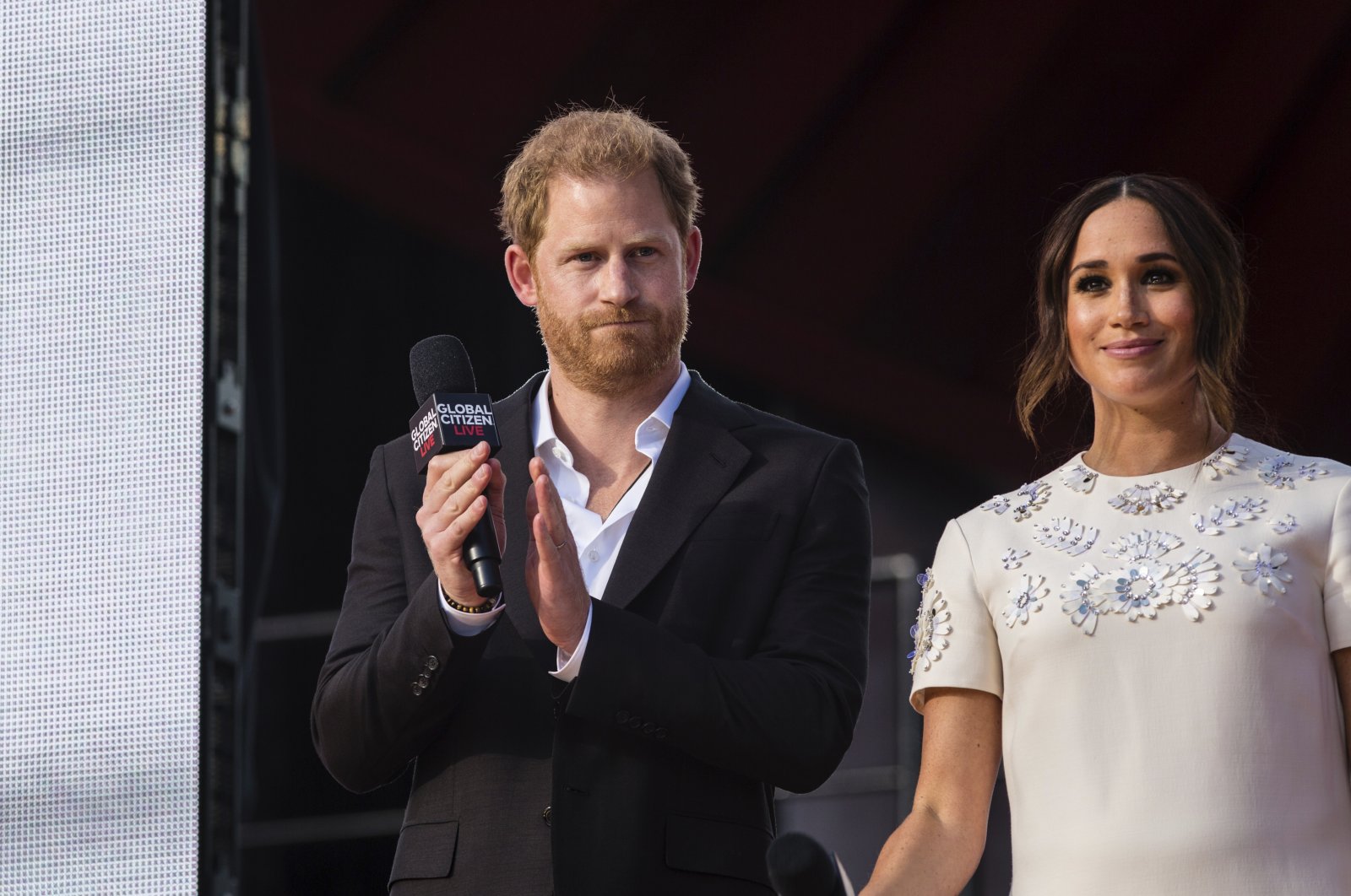 Prince Harry (L) and Meghan Markle speak during the Global Citizen Festival in New York, U.S., Sept. 25, 2021. (AP File Photo)