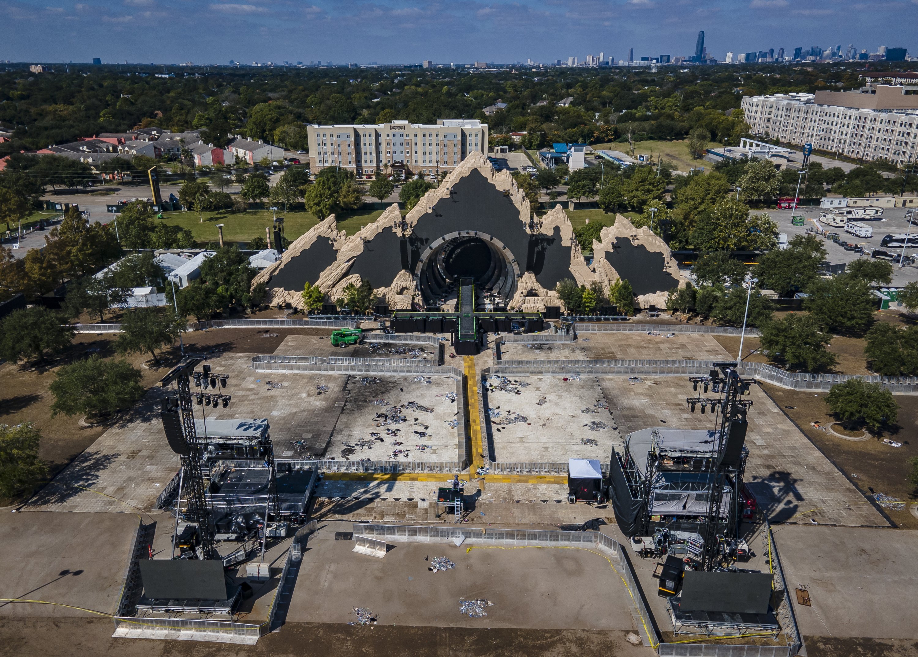 The Astroworld main stage where Travis Scott was performing Friday evening where a surging crowd killed eight people, sits full of debris from the concert, in a parking lot at NRG Center, in Houston, Texas, Nov. 8, 2021. (AP Photo)