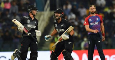 New Zealand's Daryl Mitchell (C) reacts after New Zealand's victory at the end of the ICC men's T20 World Cup semifinal against England in Abu Dhabi, Nov. 10, 2021. (AFP Photo)
