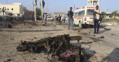 General view of the area near the wreckage of a vehicle after a suicide car bomb attack on a convoy in Mogadishu, Somalia, Nov. 11, 2021. (EPA Photo)
