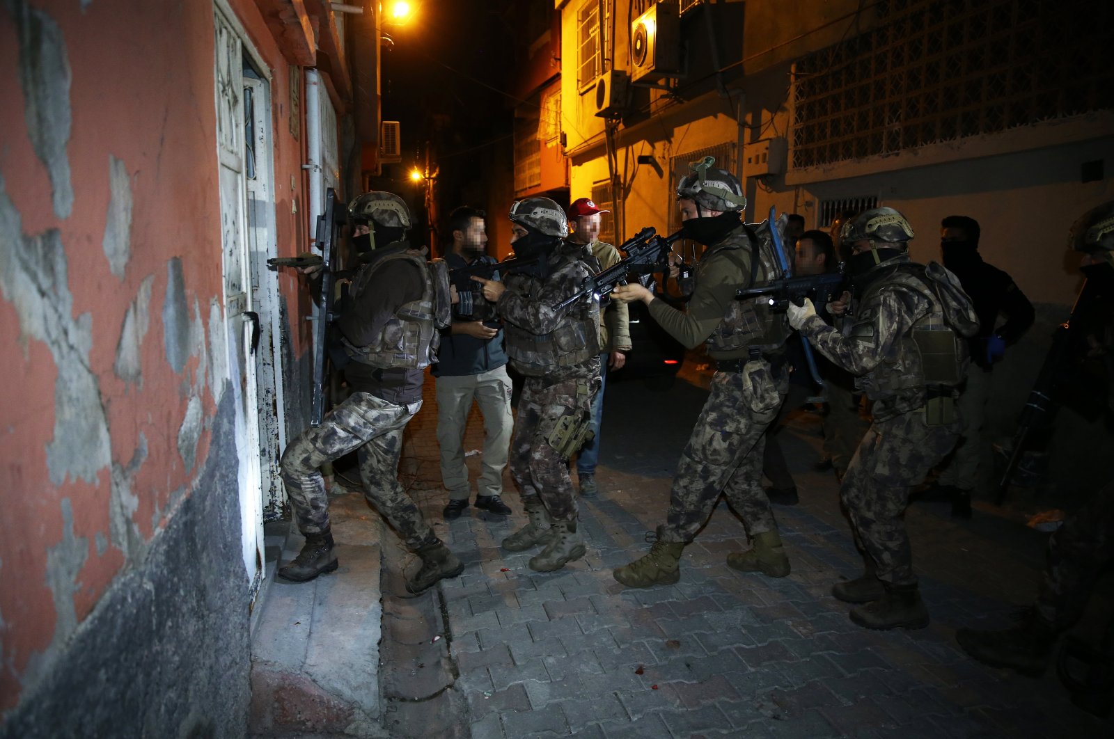 Counterterrorism squads take part in a raid against Daesh and al-Qaida members in Adana province, Turkey, March 17, 2021. (AA File Photo)