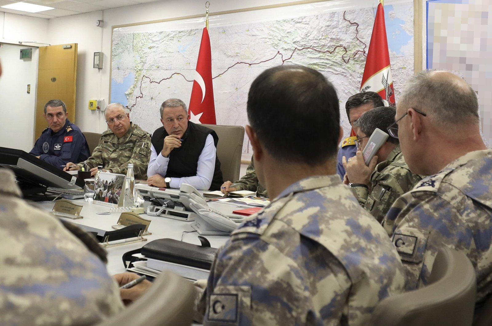 Oct. 9, 2019, Turkey's Defence Minister Hulusi Akar, center, with Turkish army's top commanders in an operation room at the army headquarters, in Ankara, Turkey. (Photo: Turkish Defense Ministry)
