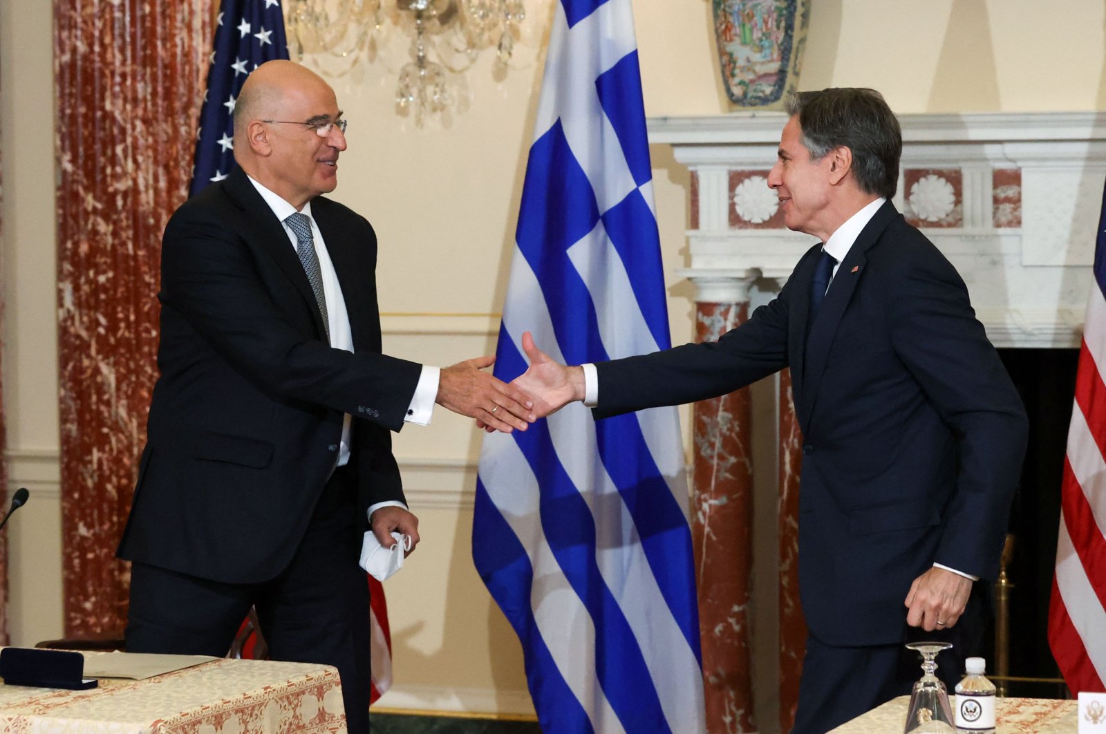 U.S. Secretary of State Antony Blinken (R) and Greek Foreign Minister Nikos Dendias shake hands after signing the renewal of the U.S.-Greece Mutual Defense Cooperation Agreement at the State Department in Washington, D.C., Oct. 14, 2021. (Reuters Photo)