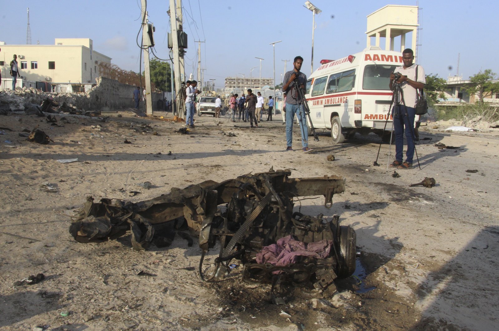 General view of the area near the wreckage of a vehicle after a suicide car bomb attack on a convoy in Mogadishu, Somalia, Nov. 11, 2021. (EPA Photo)
