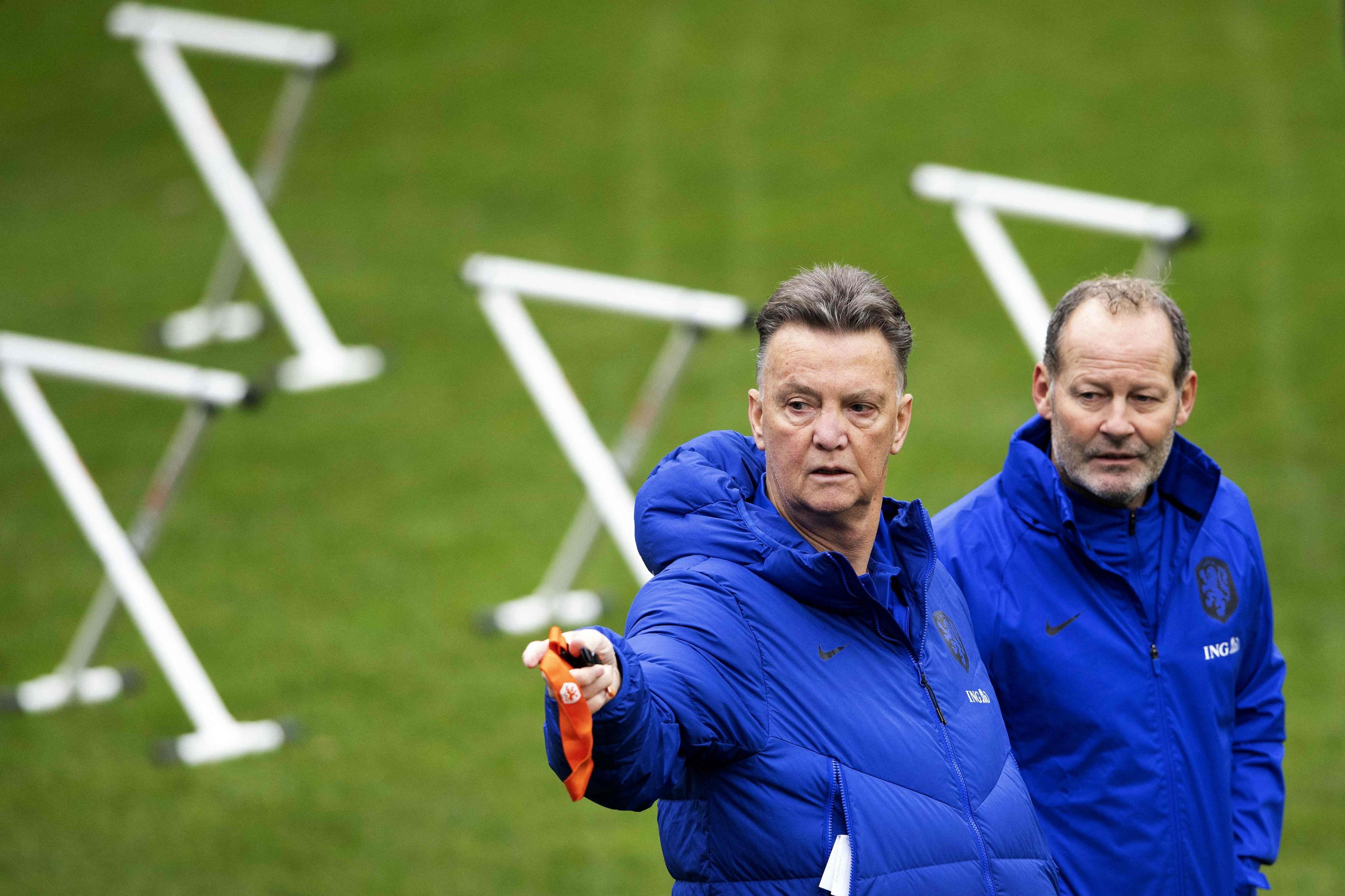Netherlands coach Louis van Gaal (L) and assistant Danny Blind (R) during a training session of the national team in Zeist, the Netherlands, Nov. 10, 2021. (AFP Photo)