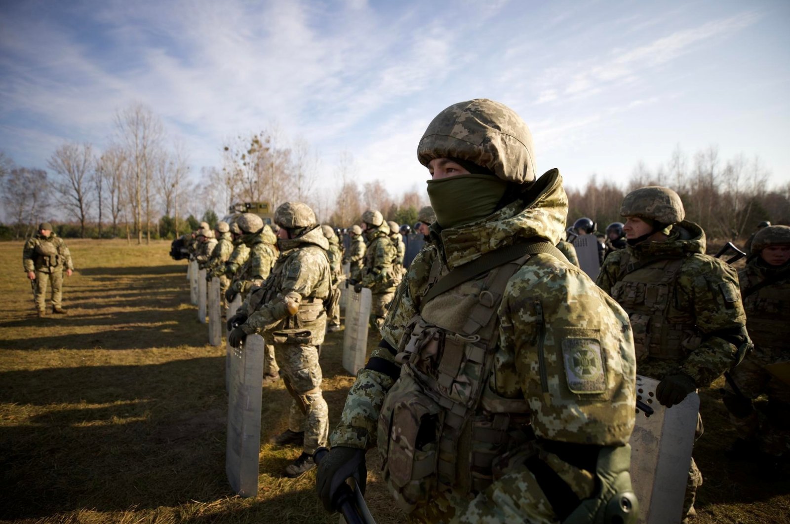 Members of the Ukrainian State Border Guard Service line up at the border with Belarus in Volyn region, Ukraine, Nov. 11, 2021. (Reuters Photo)