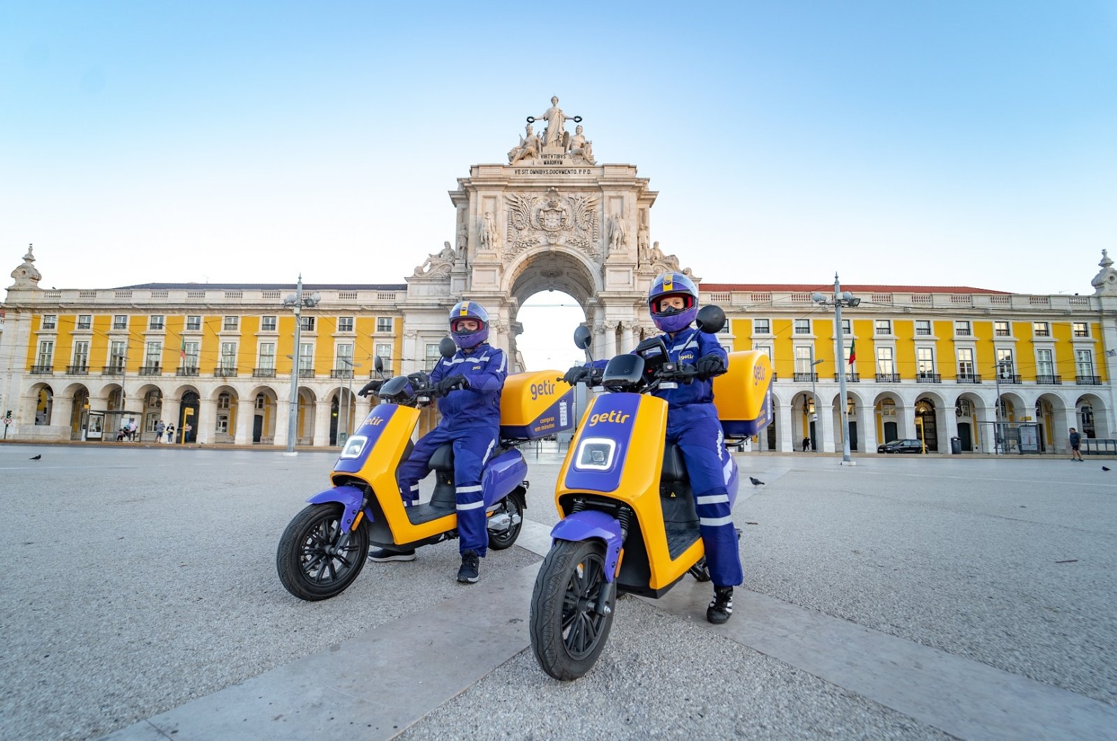 Getir couriers are seen in Lisbon, Portugal, Oct. 19, 2021. (DHA Photo)