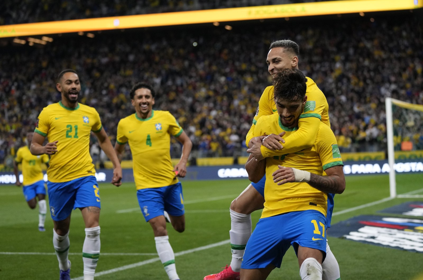 Brazil's Lucas Paqueta (R) celebrates with teammates after scoring against Colombia during a Qatar 2022 World Cup qualifier in Sao Paulo, Brazil, Nov.11, 2021. (AP Photo)