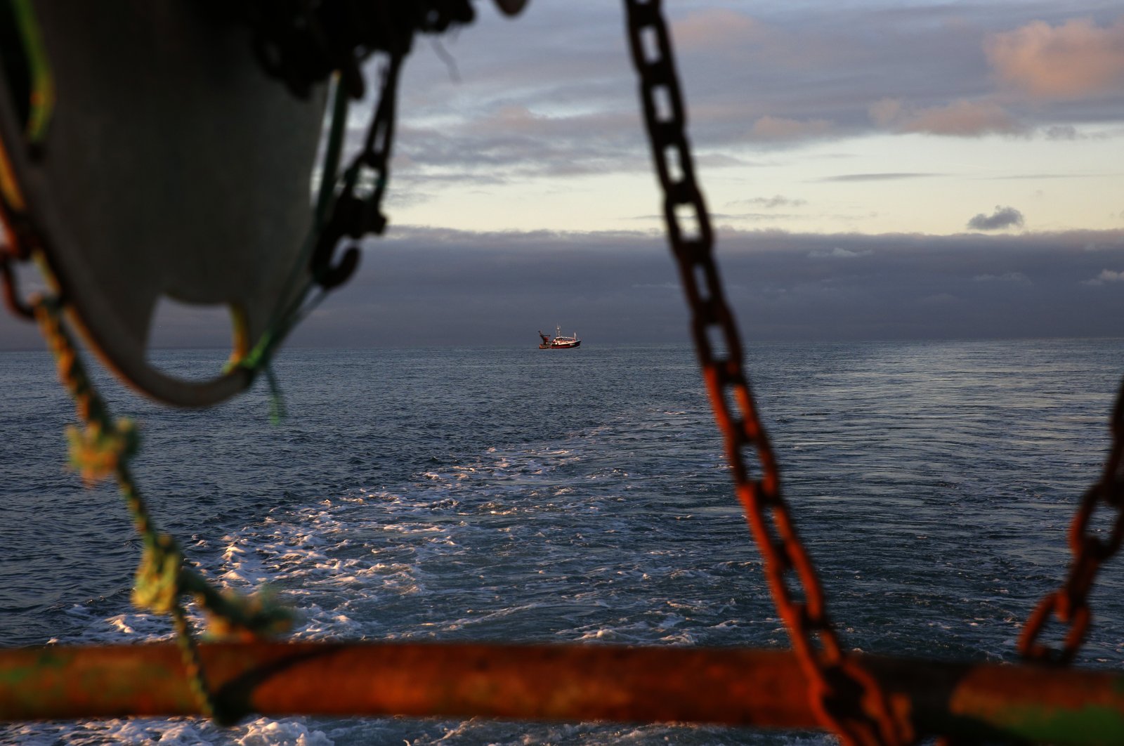 A French fishing boat is seen at the limits of the French-U.K. waters, from the trawler Le Chant des Sirenes (The Mermaids' song), off Granville, Normandy, Nov. 9, 2021. (AP Photo)