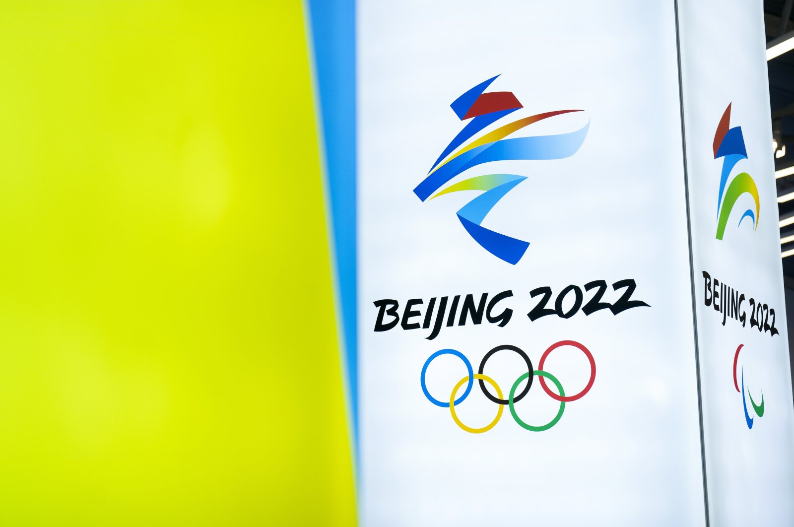 The logos for the 2022 Beijing Winter Olympics and Paralympics are seen in Beijing, China, Feb. 5, 2021. (AP Photo)
