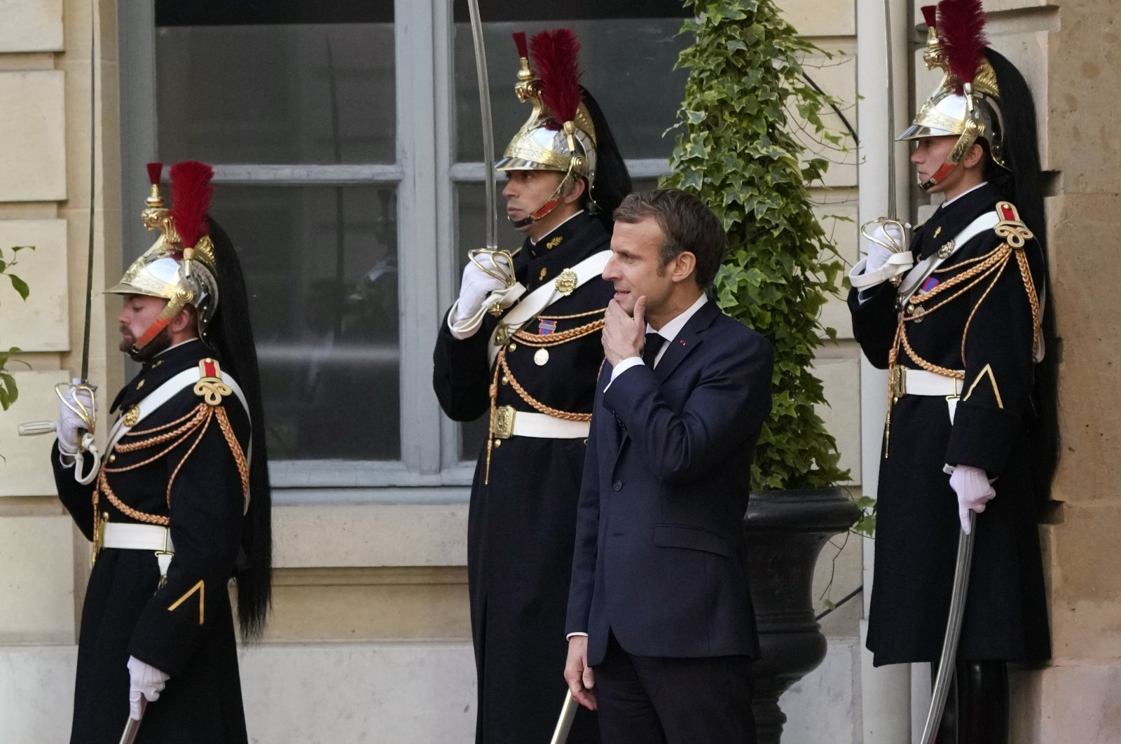 France's President Emmanuel Macron waits for world leaders before a conference in Paris, Friday, Nov. 12, 2021. (AP Photo)