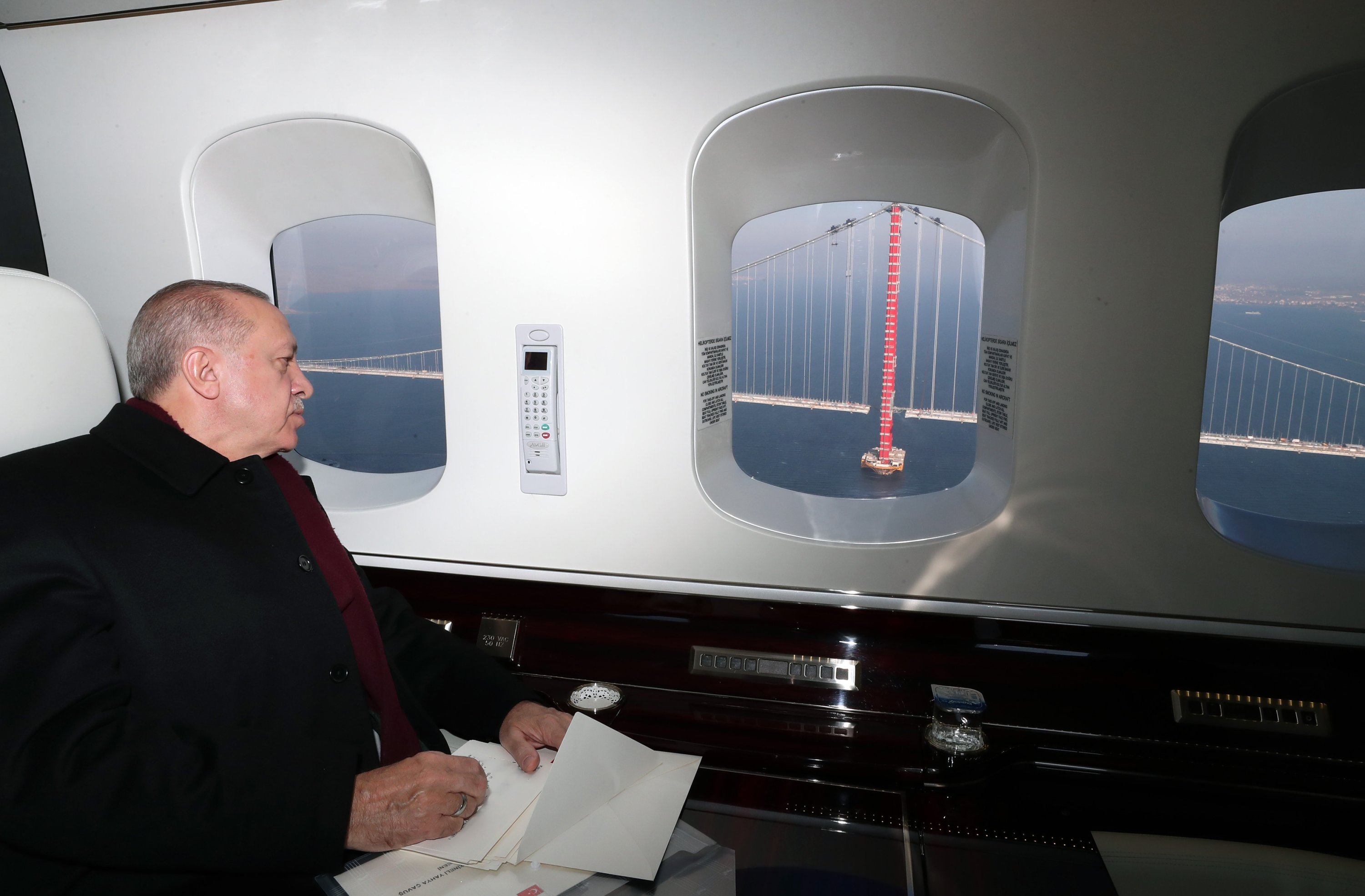 President Recep Tayyip Erdoğan inspects the latest progress on the 1915 Çanakkale Bridge from a helicopter before a ceremony, in Çanakkale, nothwestern Turkey, on Nov. 13, 2021. (AA Photo)